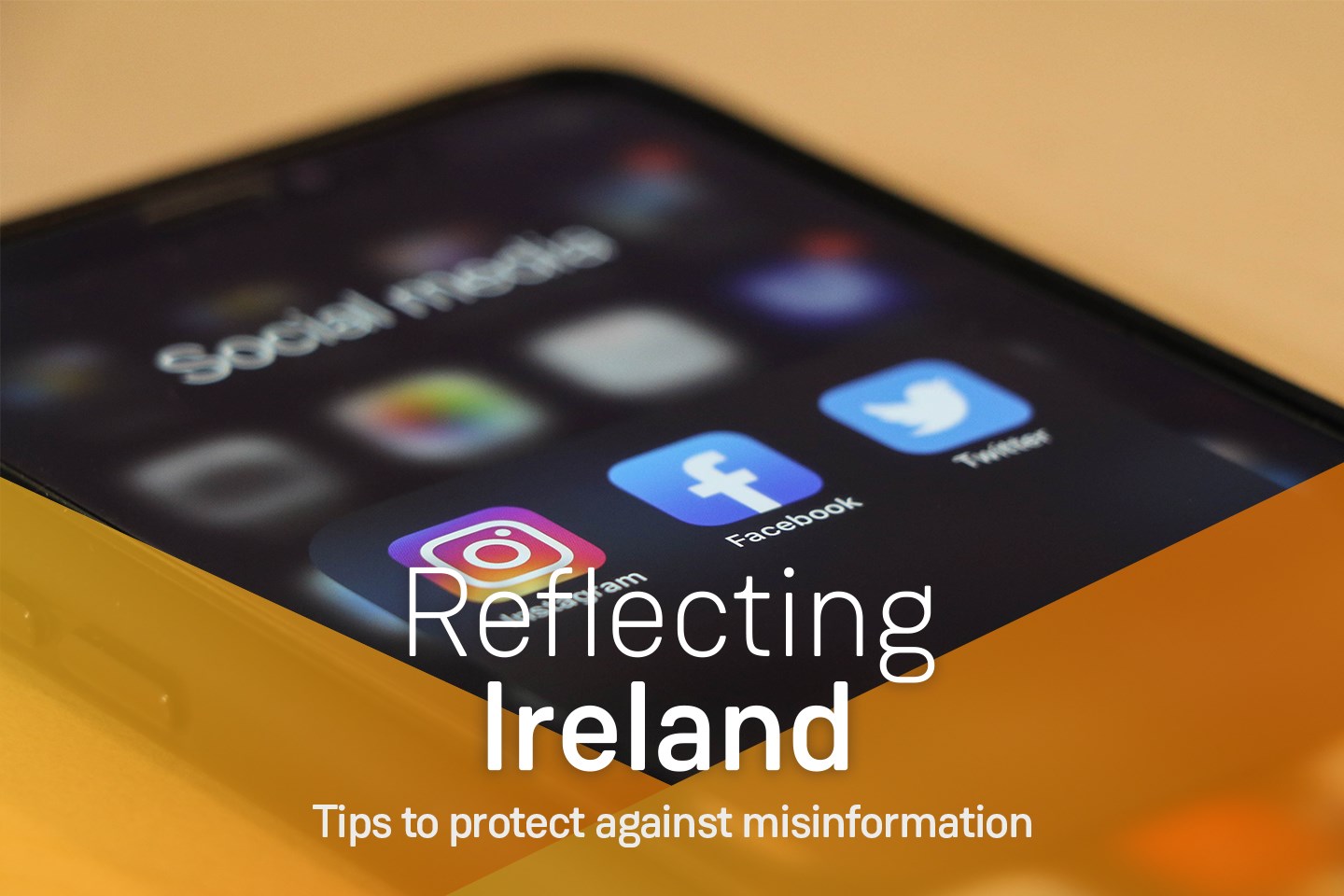 Close up on a mobile phone screen with social media , text on image 'Reflecting Ireland, Tips to protect against missinformation'